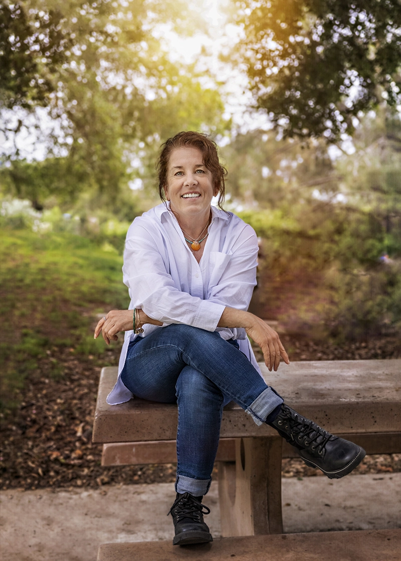 Joanne Barratt sitting on a bench.