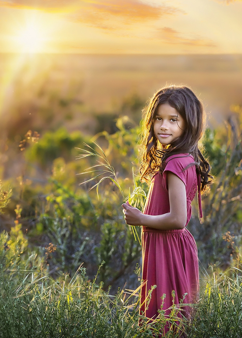 Little girl posing in nature.