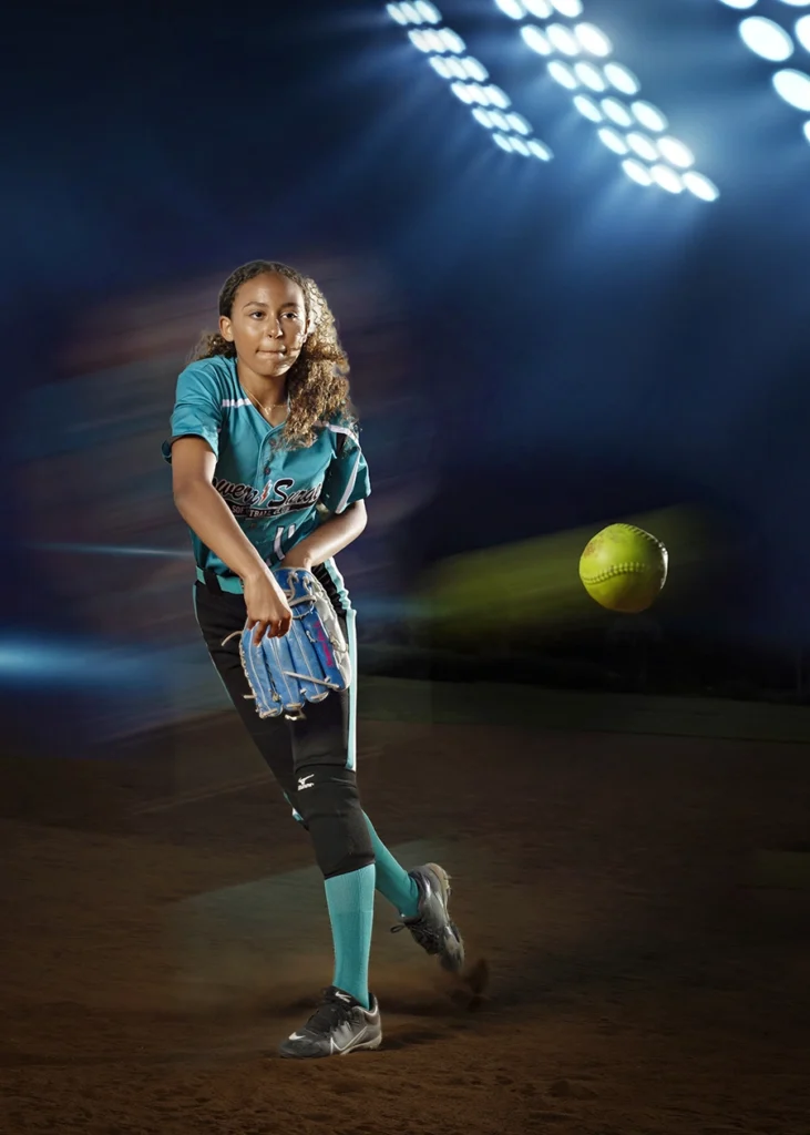 Sports Rock Media Photography: Young girl throwing the baseball.